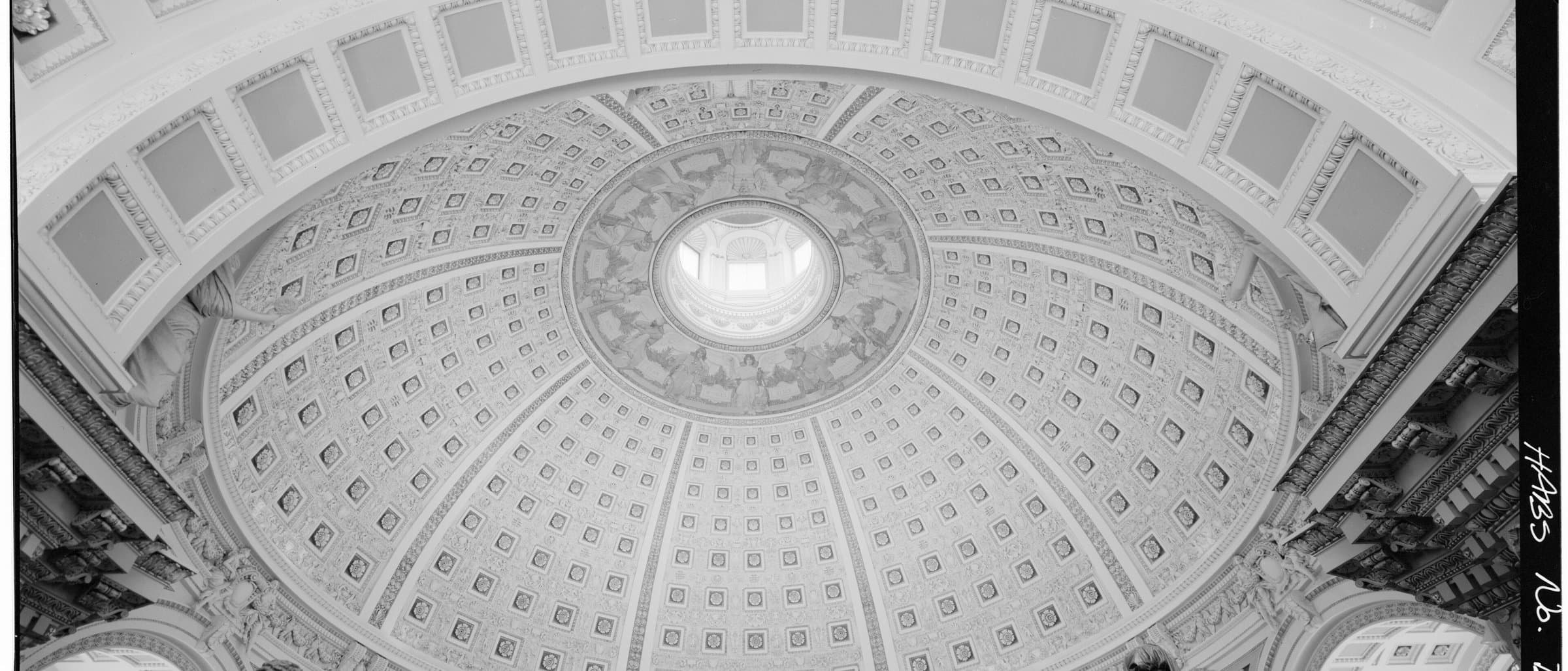 The domed main reading room of a national library, seen from the floor.